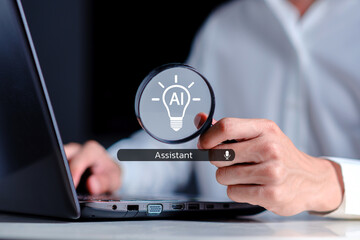 Person Using Laptop with AI Assistant Icon and Light Bulb Concept, Technology and Innovation Demonstration in Modern Workspace Environment