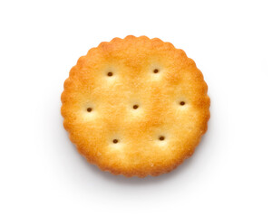 One round cracker on a white background with a shadow. Cookies isolated close-up