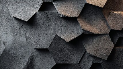 Abstract geometric background with textured hexagonal shapes in shades of gray and gold, creating a modern and sophisticated visual pattern with depth and shadow