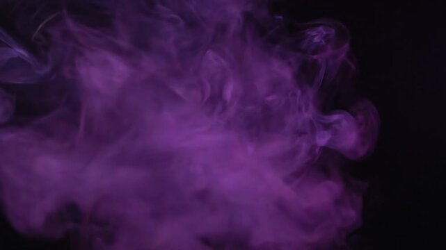 Swirling purple smoke plumes against a dark backdrop, atmospheric