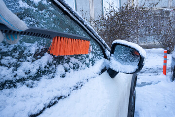 A car in the snow early in the morning