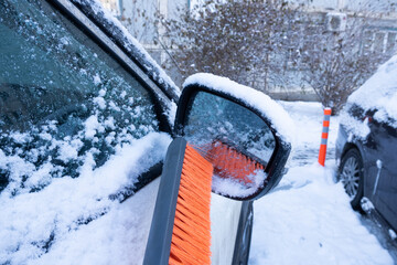 A car in the snow early in the morning