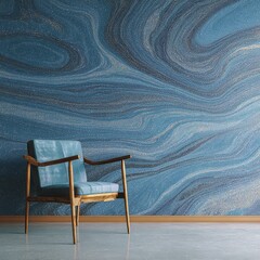 A modern armchair with blue upholstery sits in front of a striking blue and silver mosaic wall, creating a luxurious and artistic interior design