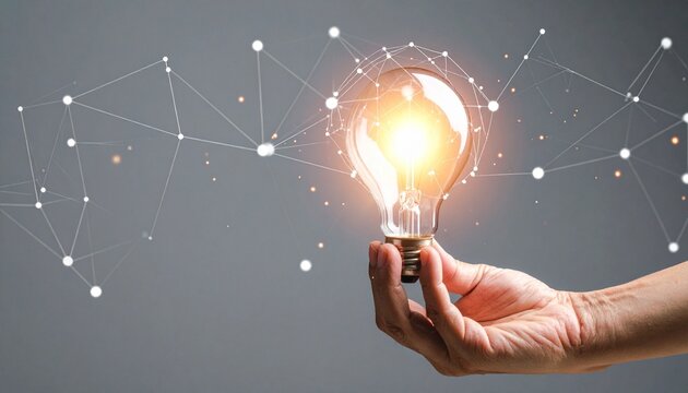 Glowing light bulb held by hand, surrounded by abstract network lines, symbolizing innovation and ideas.