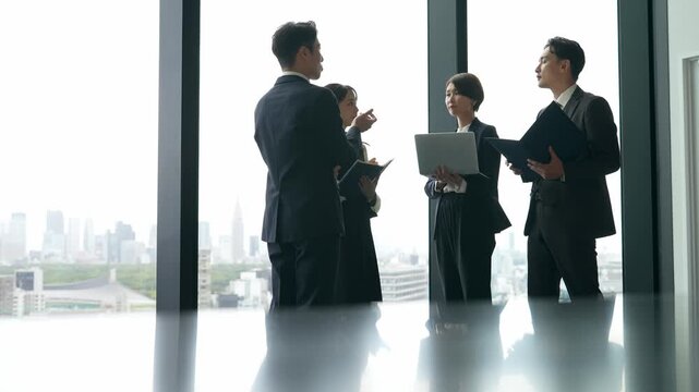Group of business people having a conversation in the office