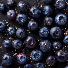 Closeup shot of fresh blueberries scattered with golden glitter on a dark textured background, highlighting their natural beauty and vibrant color
