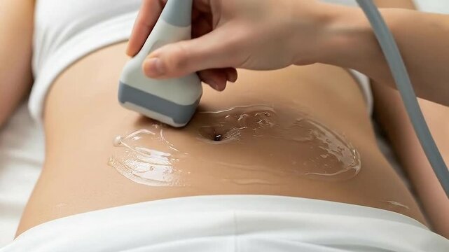 Close-up of medical ultrasound probe on woman's abdomen with clear gel promoting internal organ examination health screening diagnostics and patient care