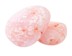 Two smooth, pinkish-toned, speckled egg-shaped stones sit against a dark backdrop