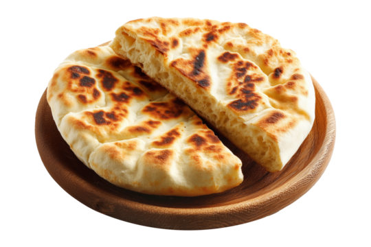 Traditional pita bread or flatbreads pieces, isolated on white background. Concept of Arabic Cuisine