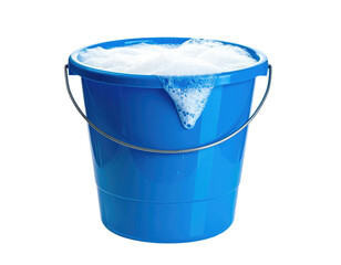 A blue bucket overflows with frothy white bubbles, handle arched, dark background