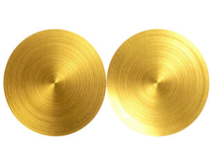 Two golden, circular objects with a radial texture, set against a black background