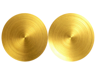 Two golden, circular objects with a radial texture, set against a black background