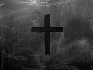 A dark charcoal cross drawn on a textured blackboard surface