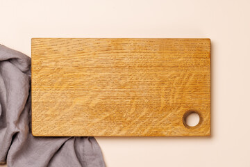 Empty cutting board and towel top view