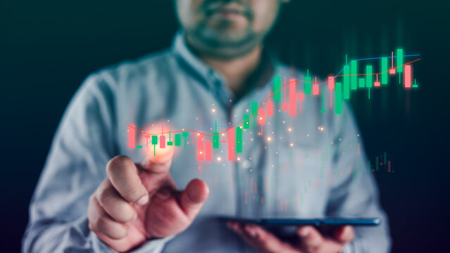 A businessman or trader hand touch a virtual stock market chart, Business investment earning income concept. Stock market for analysis, technical graph - Powered by Adobe
