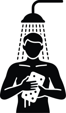 Silhouette of Person Taking Shower with Sponge, Water Falling from Showerhead in Black
