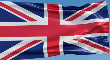 A vibrant union jack flag waving gently against a clear blue sky in a patriotic display of unity