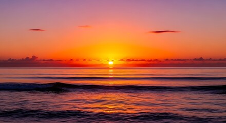 Naklejka premium Vibrant Sunset Over the Ocean with Gentle Waves.