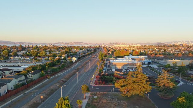 A smooth aerial pass displays Atlantic Avenue's lively activity, blending community life, commercial spaces, and Alameda&rsquo;s recognizable island atmosphere.