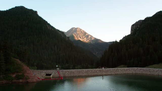 Tibble Fork Reservoir Lake near Timpanogos in American Fork Canyon Wasatch Mountains of Utah at Sunset