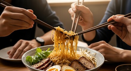 Close-up of hands using chopsticks to lift noodles from a ramen bowl with meat and vegetables, concept for culinary experiences, food blogging and restaurant promotions