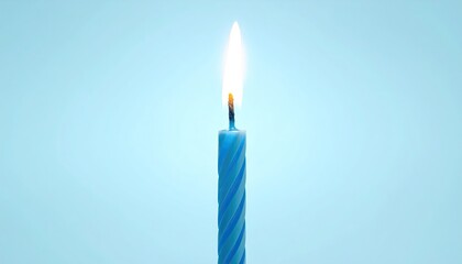 Lit blue candle with a bright flame