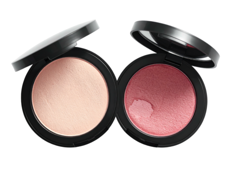Two open cosmetic compacts, one pale, one rose-toned, on a stark black background