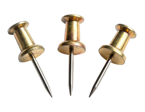 Three gold-toned pushpins with shiny metallic needles, isolated on black