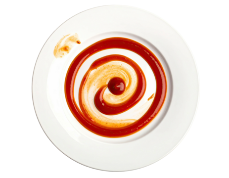 A white plate has a spiral of red sauce with a small dot in the center