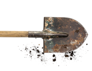A worn metal shovel with a wooden handle rests on dark soil, showing signs of use