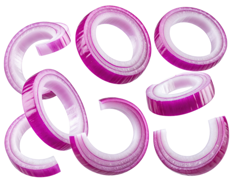 Floating, sliced, vibrant red onion rings against a stark black background