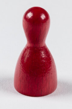 single red wooden game piece