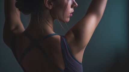 Obraz premium Graceful Profile of Young Woman in Soft Light with Relaxed Pose