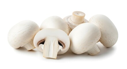 Four fresh white button mushrooms, with one sliced in half to reveal its gills, set on a clean, bright white background
