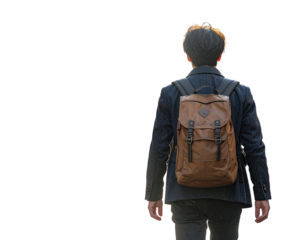 A person with a brown backpack walks away from the camera. They wear a dark jacket and have short, dark hair