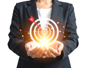 A person in a suit holds a glowing target with an arrow centered, symbolizing goals and success
