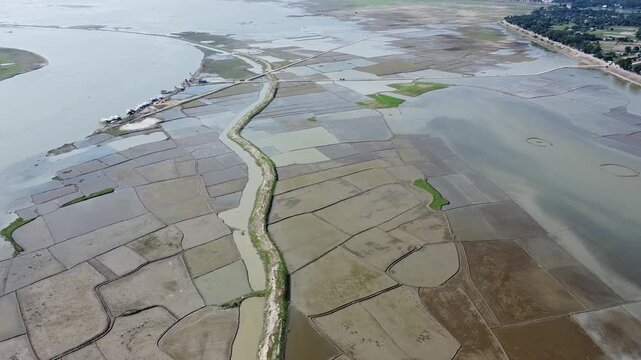 Bangladesh faces flooding and crop damage due to sudden water inflow from India, affecting riverside communities and agricultural lands.Bangladeshi farmers cannot grow crops as floodwaters flood