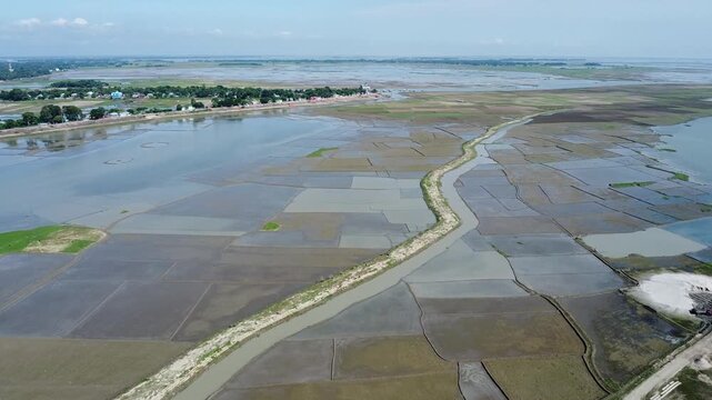 Bangladesh faces flooding and crop damage due to sudden water inflow from India, affecting riverside communities and agricultural lands.Bangladeshi farmers cannot grow crops as floodwaters flood