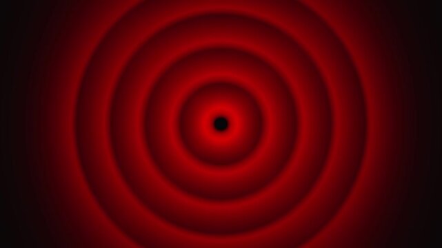 Concentric Red Circles Radiating from a Dark Center on a animation Black Background abstract. Pulsing crimson rings radiating outward with soft glowing edges in continuous circular animation.