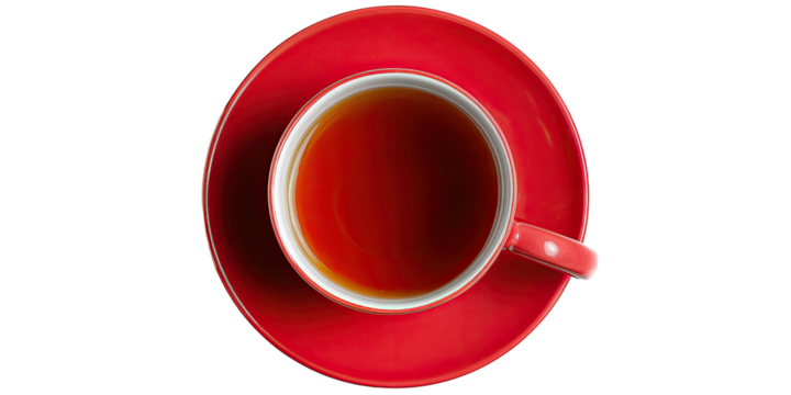 Red cup of dark tea, saucer beneath, from above view