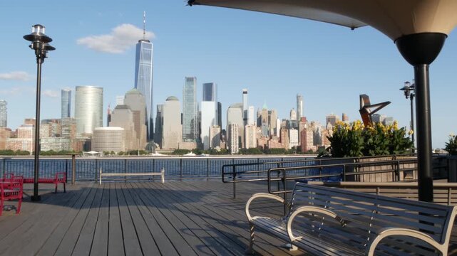 New York City Manhattan downtown financial district skyline, New Jersey Exchange Place, United States. Urban cityscape with skyscraper buildings, World Trade Center. J Owen Grundy park, Paulus Hook.