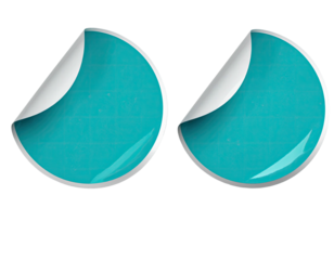 Two turquoise, textured circular stickers, one peeling at the corner