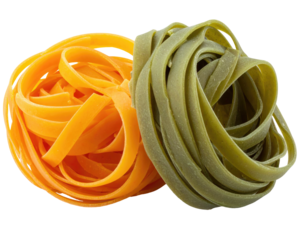 Close-up of two nests of colored pasta, one orange, one green, against black