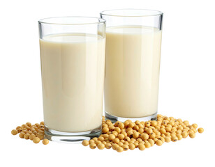 Two tall glasses of creamy beverage with soybeans at their base, on white
