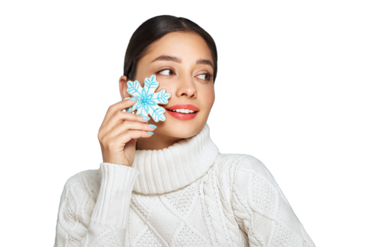 Woman in a white knitted sweater with cookie Snowflake isolated on transparent background. Christmas or New Year festivities. Holiday and Party