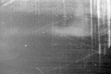 Vintage distressed old photo light leaks, film grain, dust and scratches transparent texture overlay with vignette border. Dirty grunge analog 8k widescreen retro effect background with copy space.