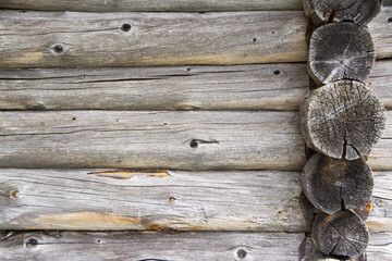 Aged log wall construction close up.