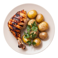 grilled chicken leg with potatoes on plate