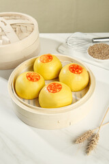 Traditional Chinese Steamed Buns in Bamboo Steamer with Red Decorative Stamps
