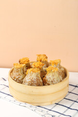 Traditional Chinese Siu Mai Dim Sum Dumplings in Bamboo Steamer - Handmade Glutinous Rice Pork Specialty Morning Tea Gourmet Food